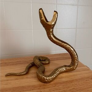 Threshold brass snake candle holder